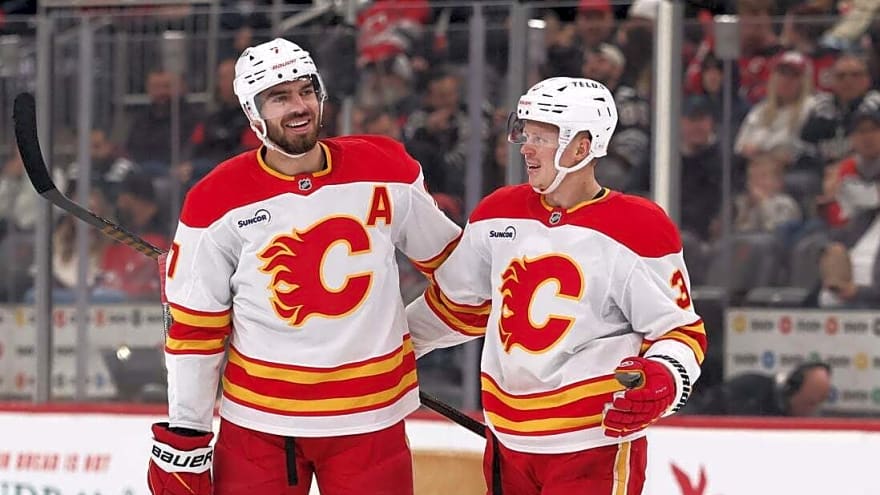 Flames hold on for win over struggling Devils