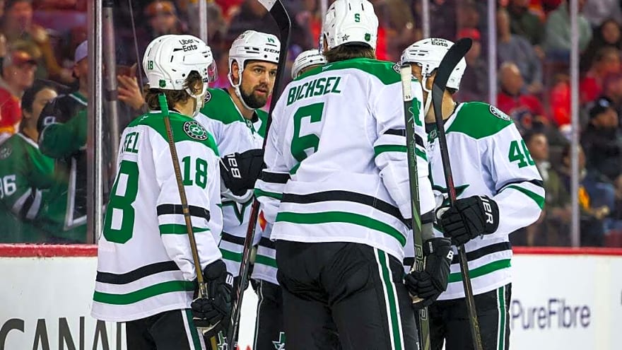 Stars stampede past Flames, push club-record win streak to 10 games