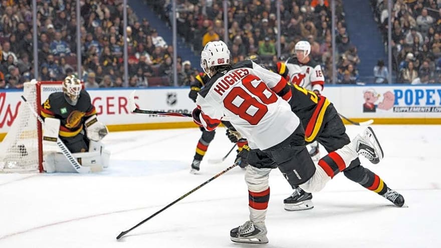 Cody Glass' 3-point night steers Devils to win over Canucks