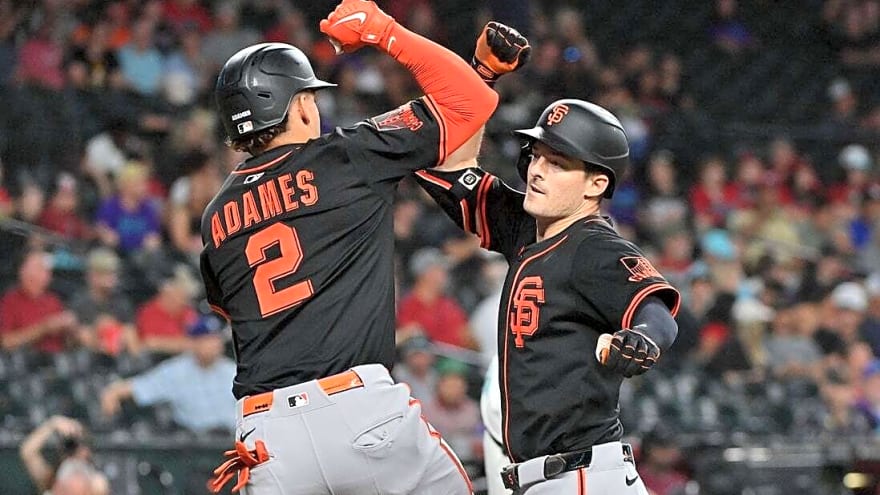 Giants blow lead but edge D-backs in 10 to end skid
