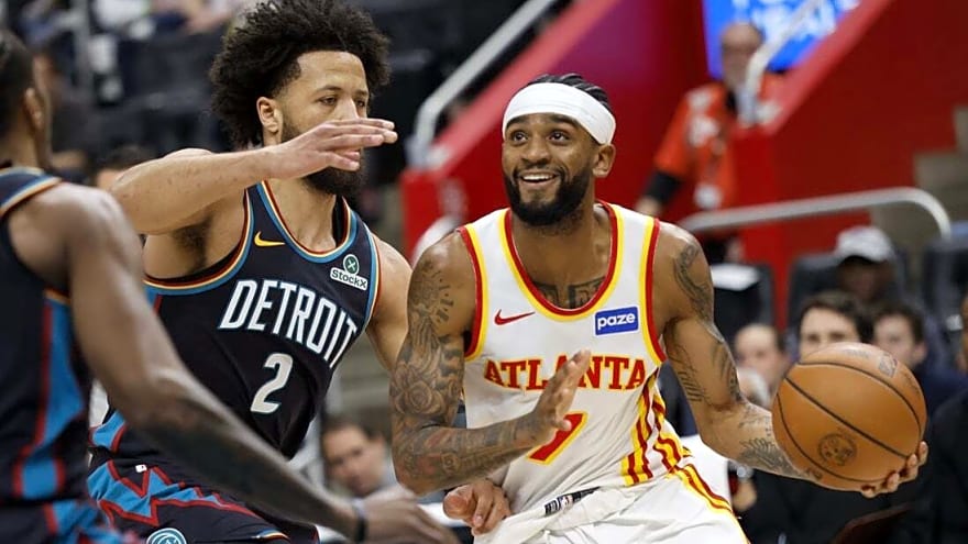 Pistons rally late, then narrowly hold off Hawks