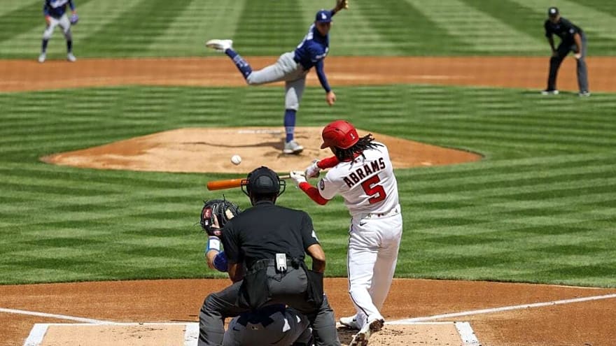 Dodgers hit five HRs, cruise to win in Nationals' home opener