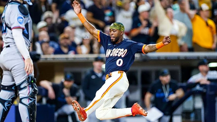 Padres blast Marlins to draw even in wild-card race