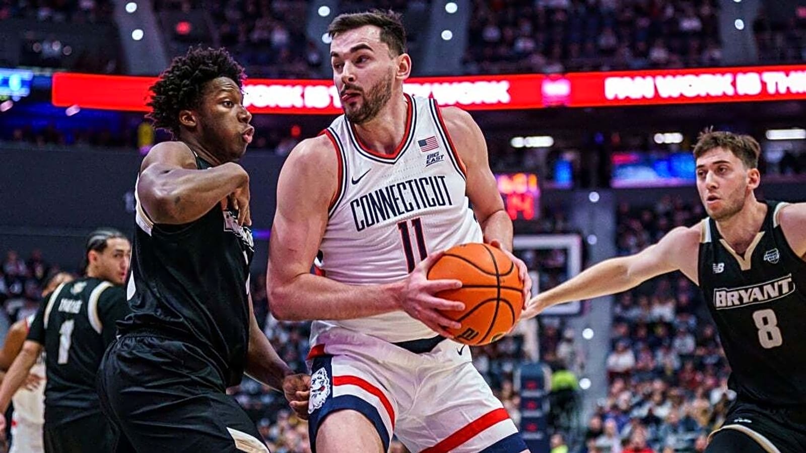 Elite programs in early battle as No. 5 UConn visits Kansas