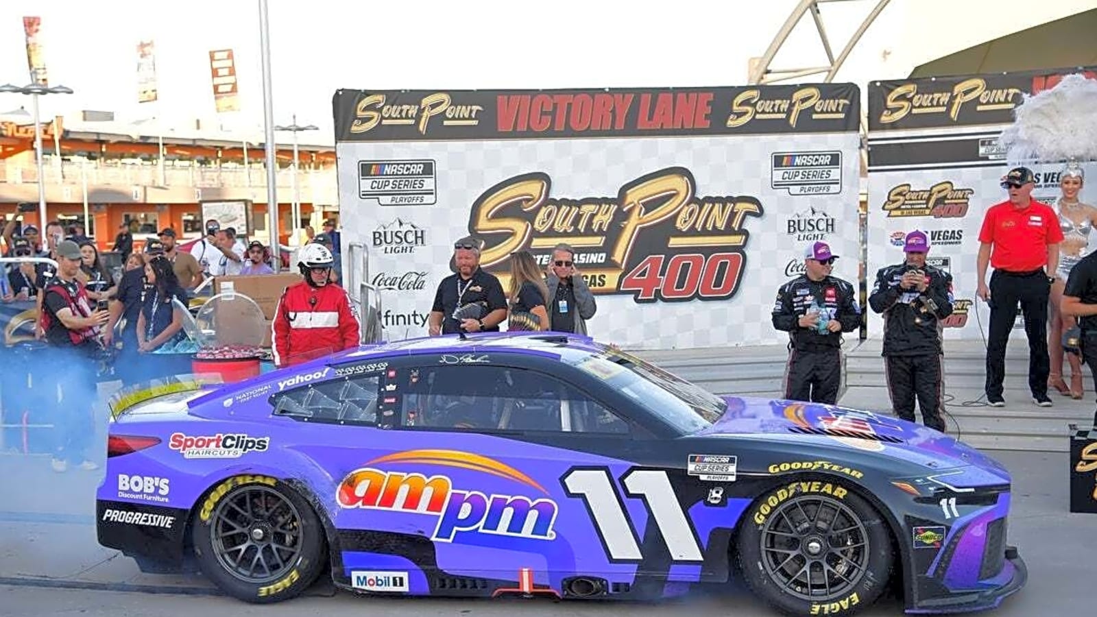 Denny Hamlin surges late to win South Point 400, ties Kevin Harvick with 60th Cup win