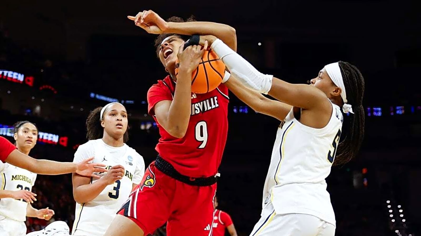 Michigan regroups, rolls past Louisville to reach Elite Eight