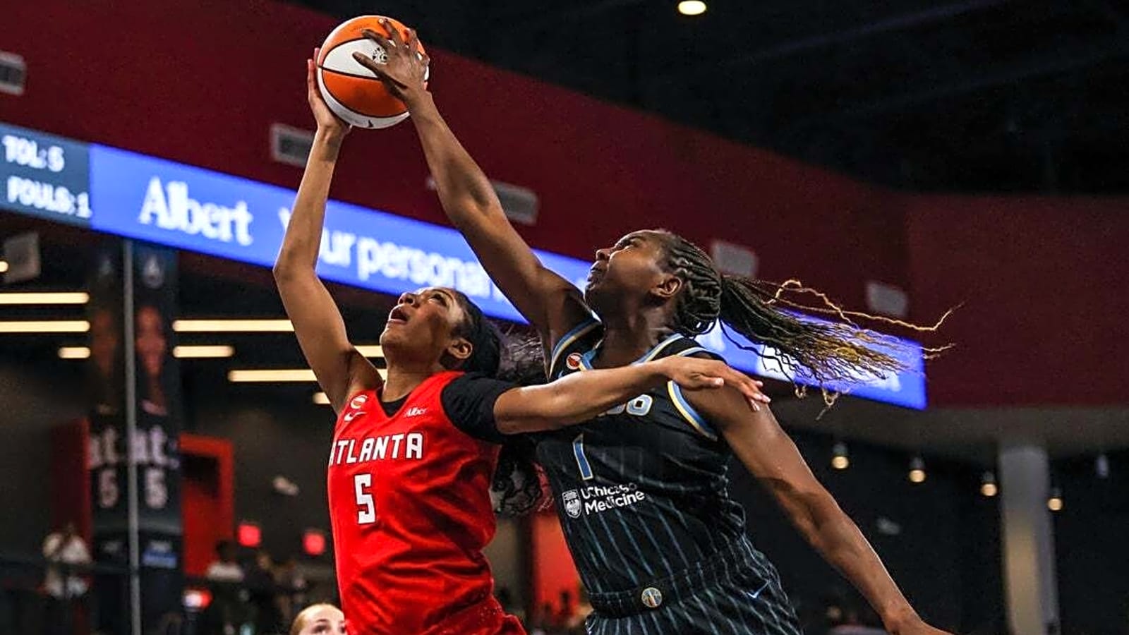 Angel Reese exits Dream's win after injuring leg
