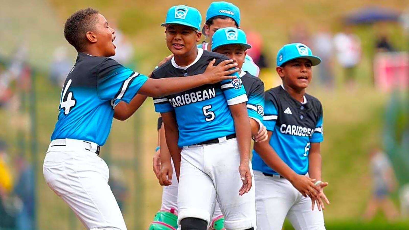 Aruba holds off Venezuela to advance to International title game