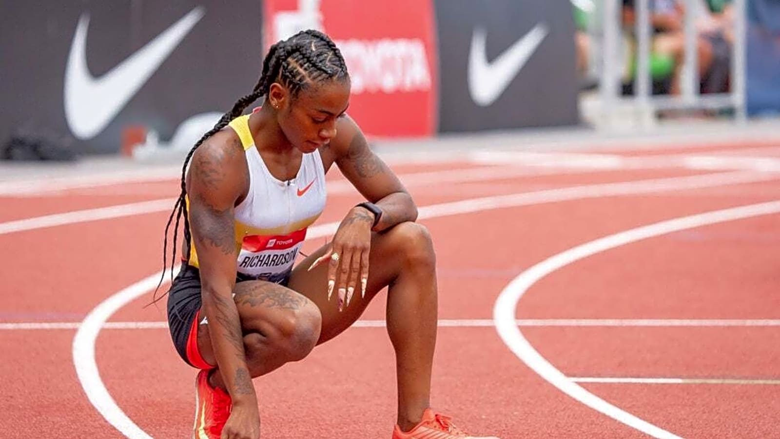 Reflective Sha&#39;Carri Richardson apologizes for airport incident