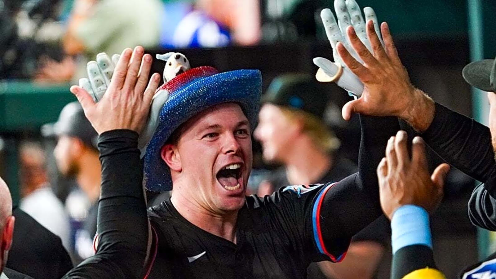 Marlins hold off reeling Rangers to win 5th straight