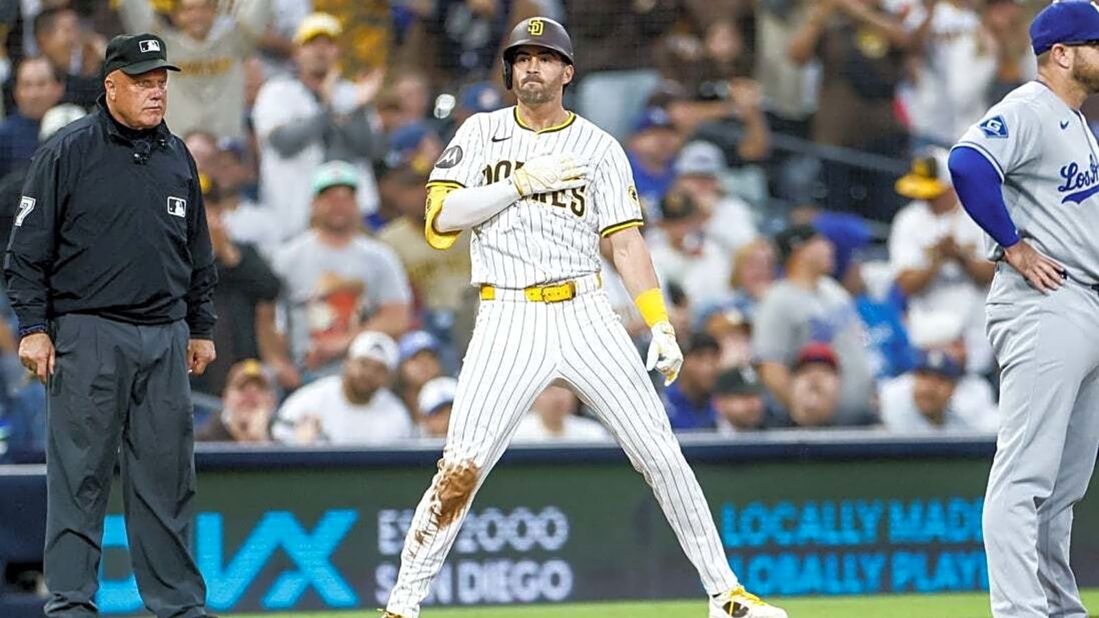 Dodgers score twice in 10th inning, hold off Padres