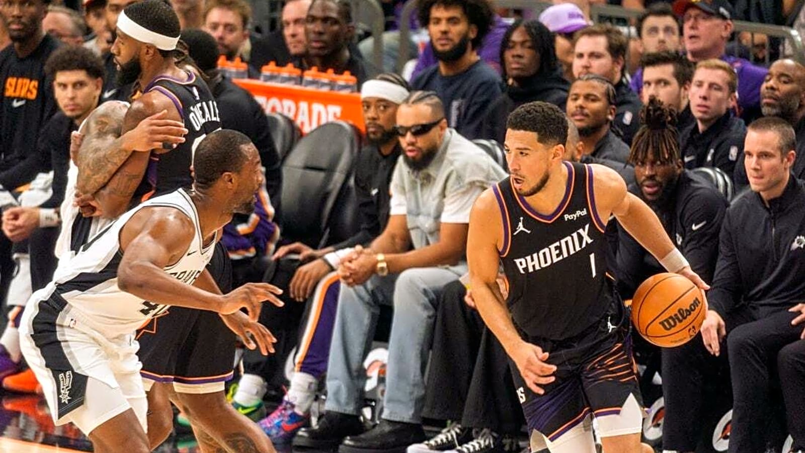 Hot-shooting Suns hand Spurs first loss