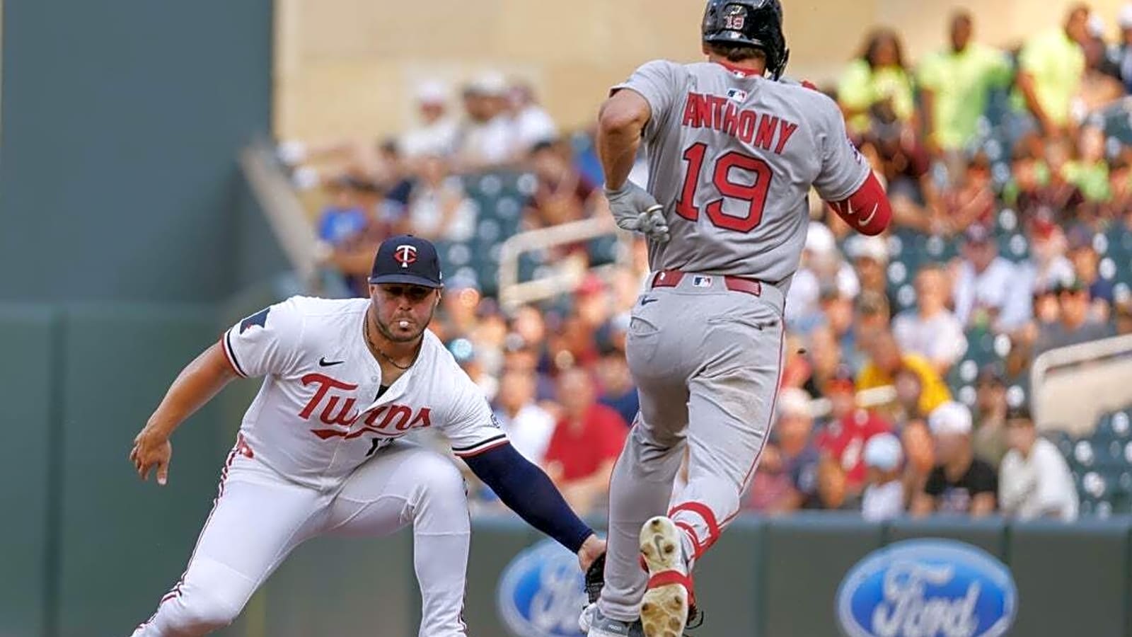 Twins wait out storm, grab walk-off win over Red Sox