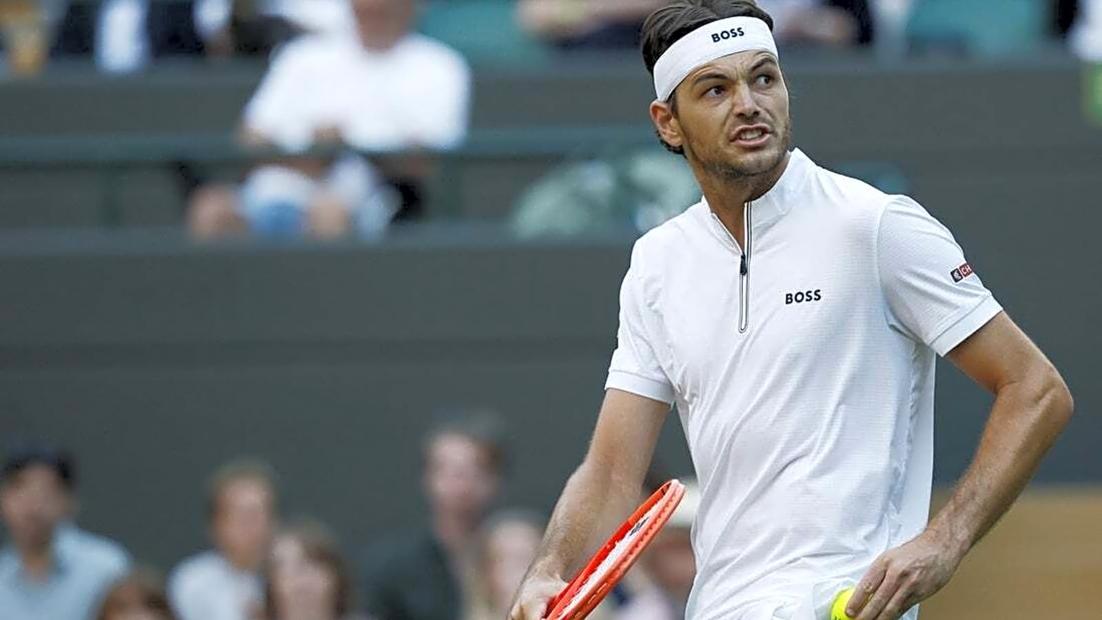Taylor Fritz staves off upset attempt to advance at Wimbledon