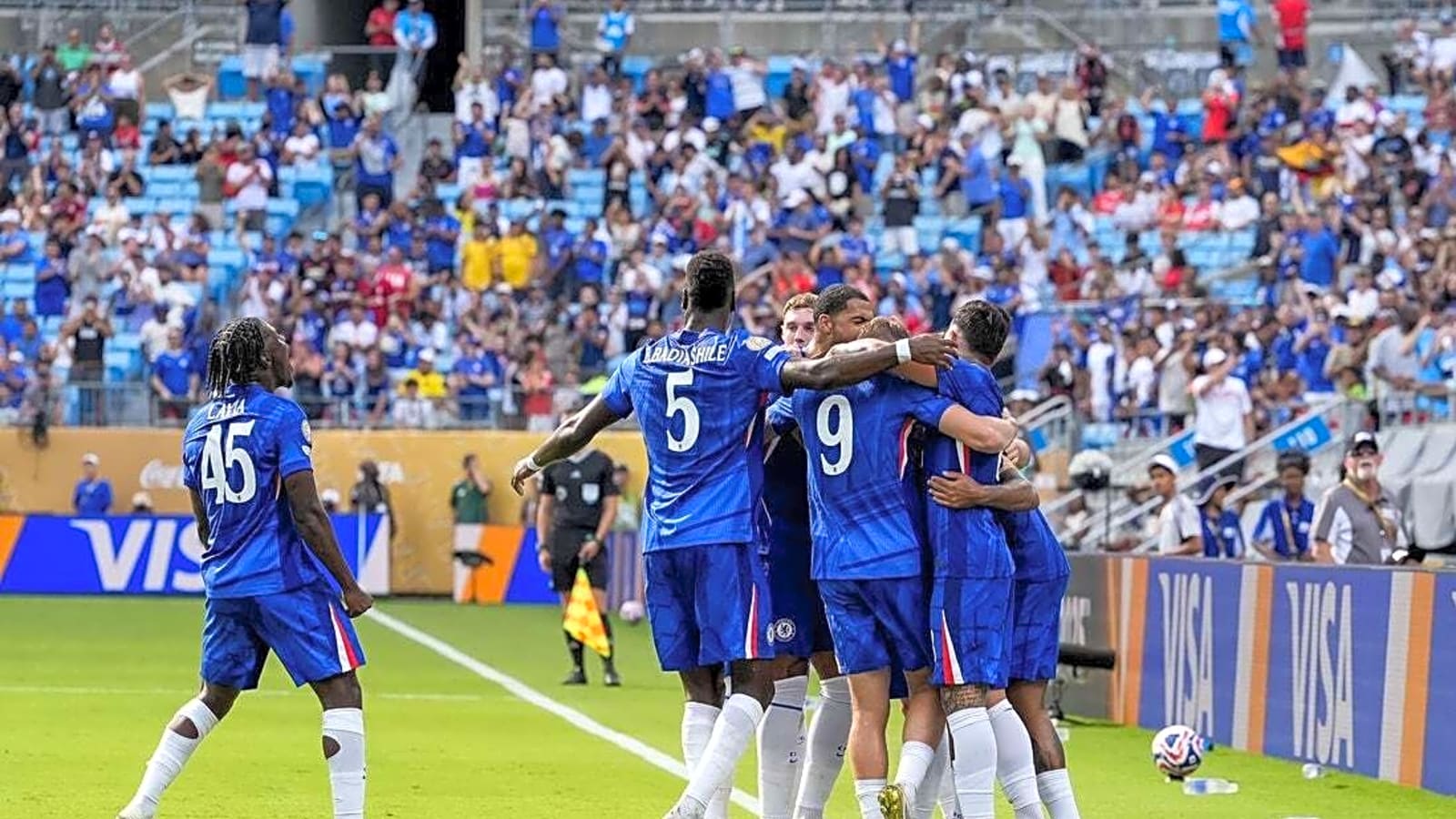 Late goals binge lifts Chelsea over short-handed Benfica