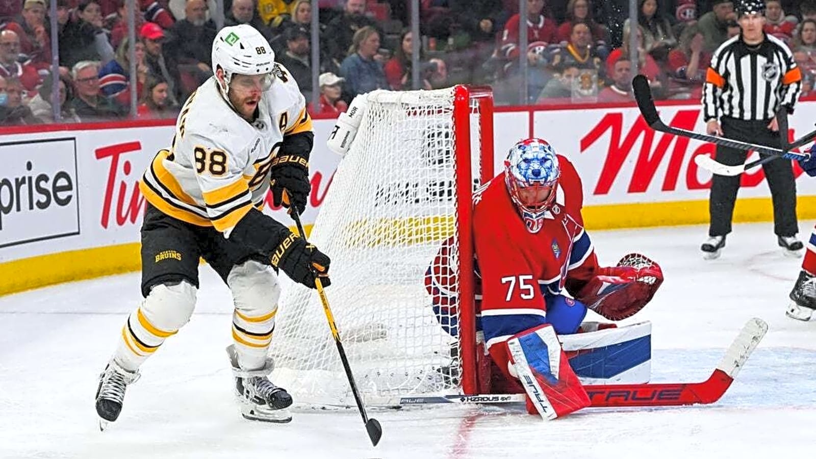 Bruins look to finish in regulation against playoff-teetering Jets