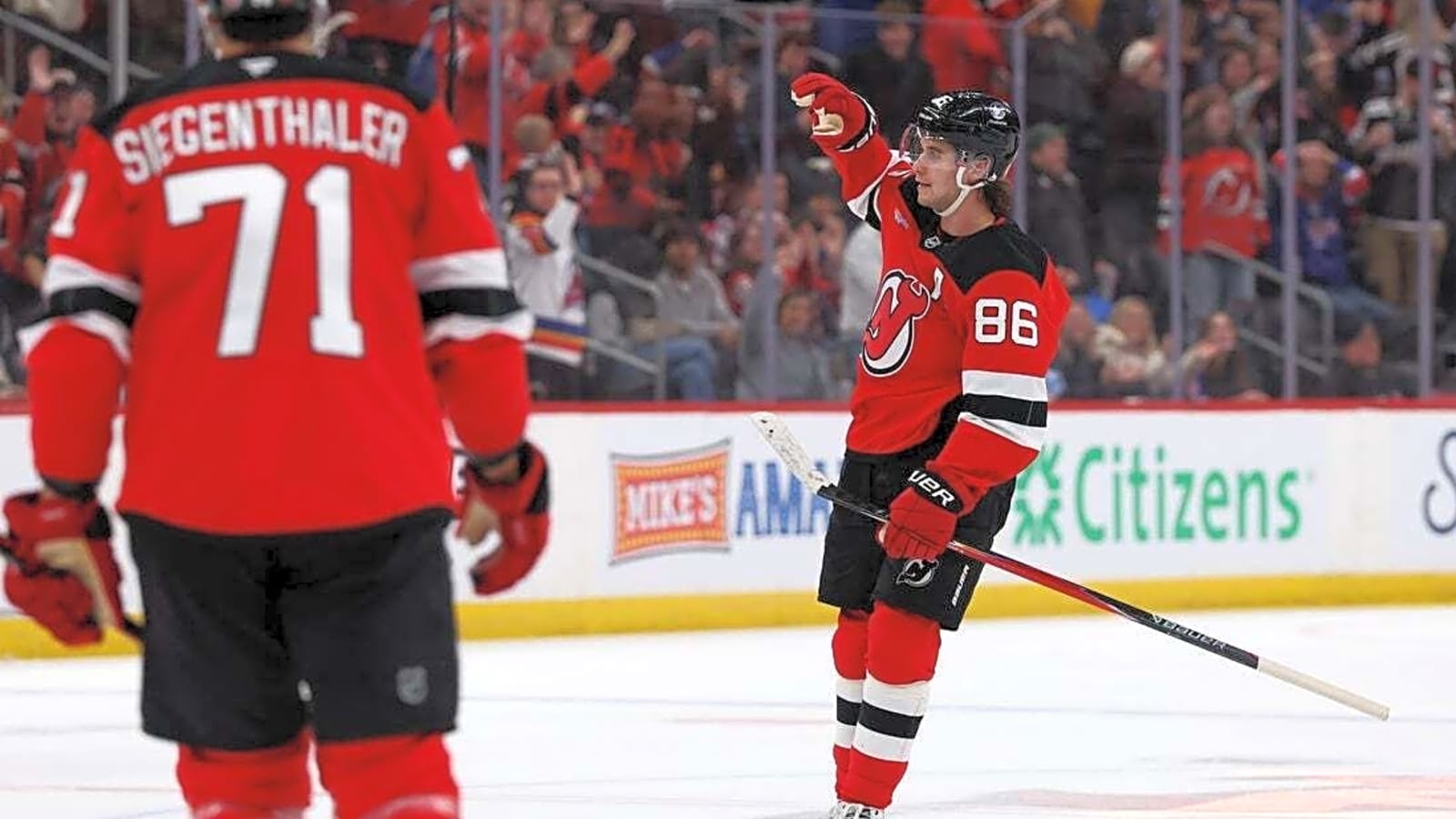 Jack Hughes' hat trick helps Devils double up Rangers
