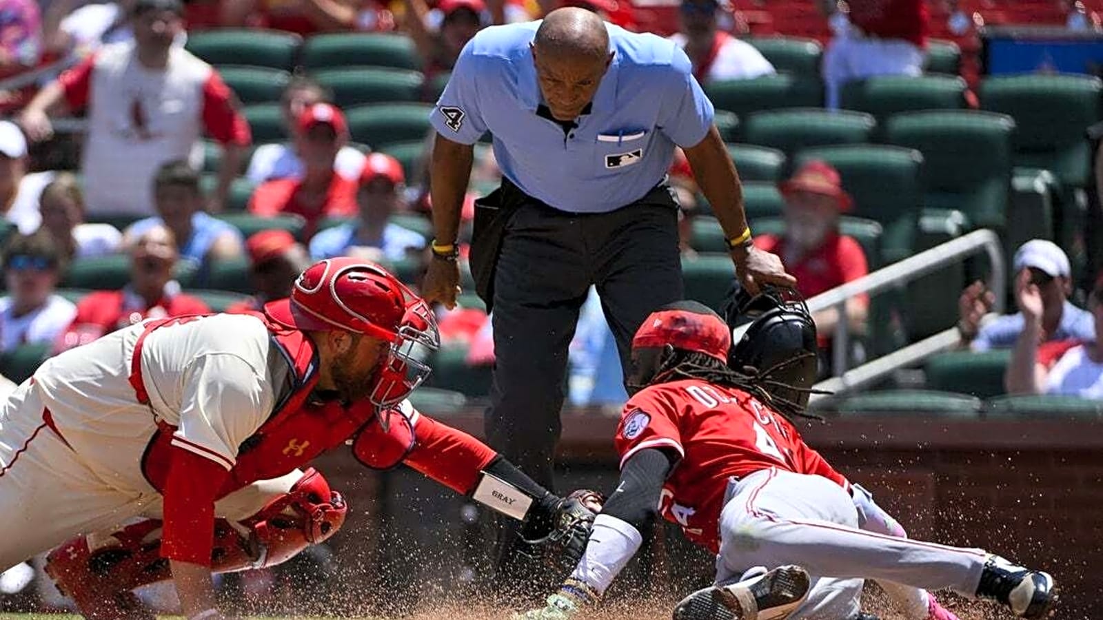 Cards rally late, upend Reds in 11 for 5th straight win