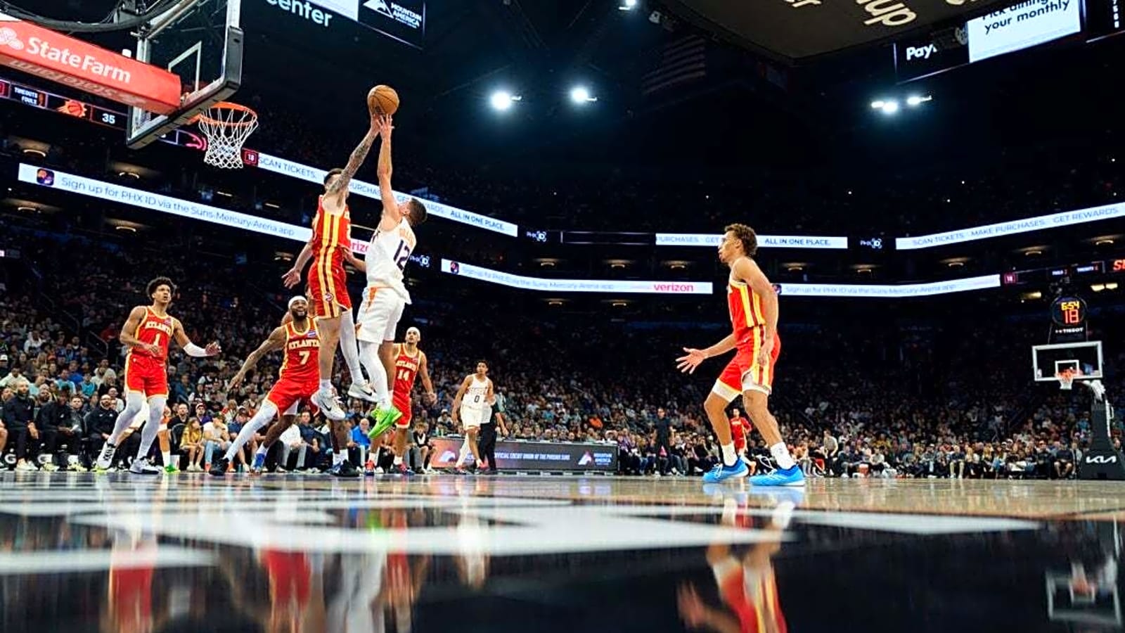 Surging Hawks storm back to beat Suns