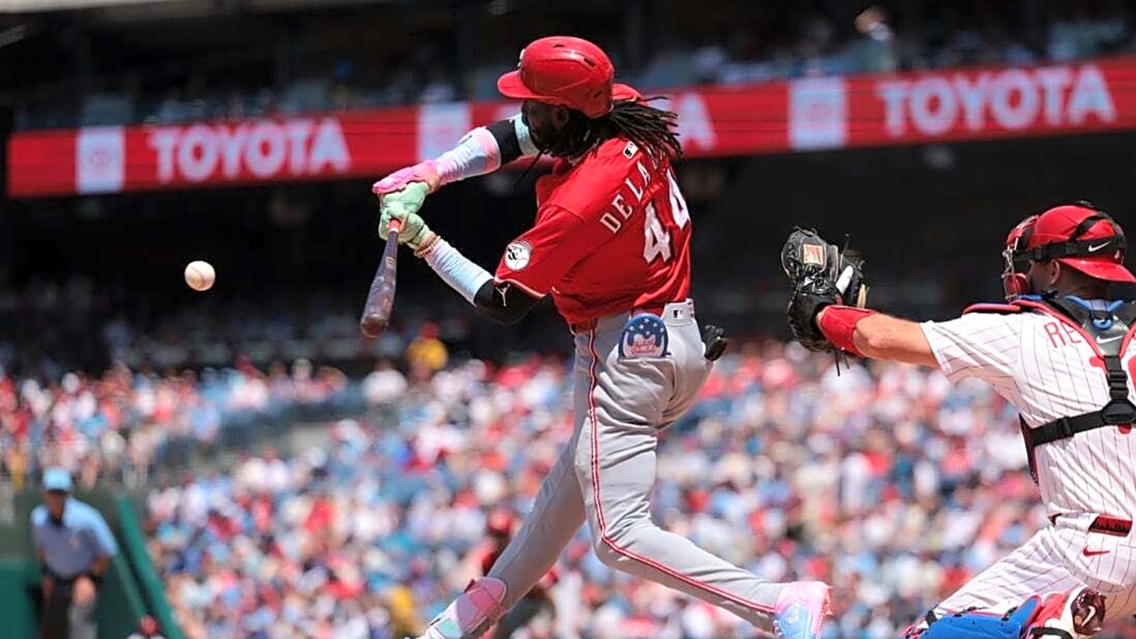 Reds erupt in 3rd, hold on to put away Phillies