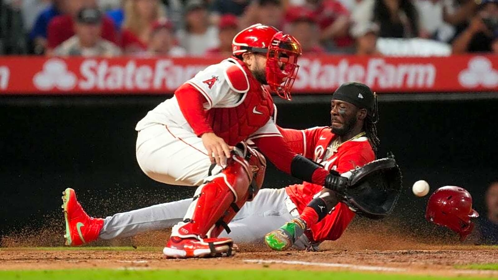 Reds score two in the ninth for their third straight win
