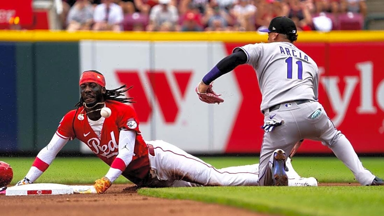 Reds rally for two in ninth to slay Rockies