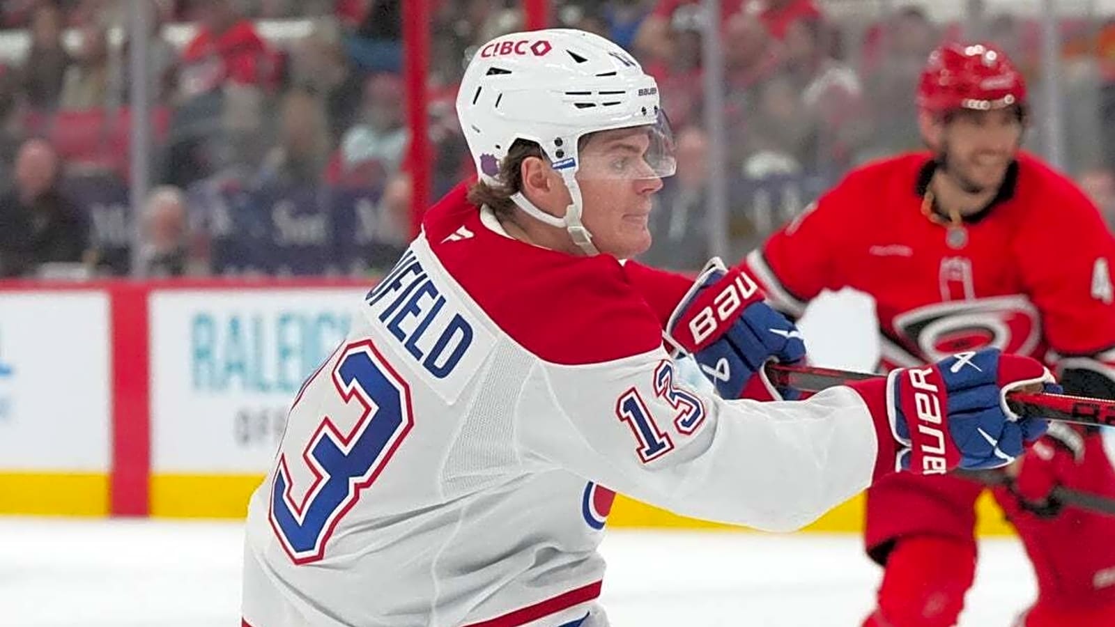 Nick Suzuki, Cole Caufield propel Canadiens past Hurricanes
