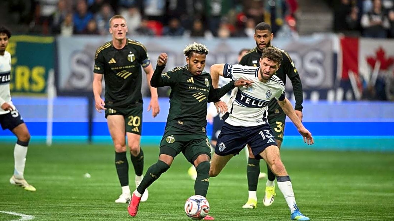 Vancouver scores twice in stoppage time to stun Portland