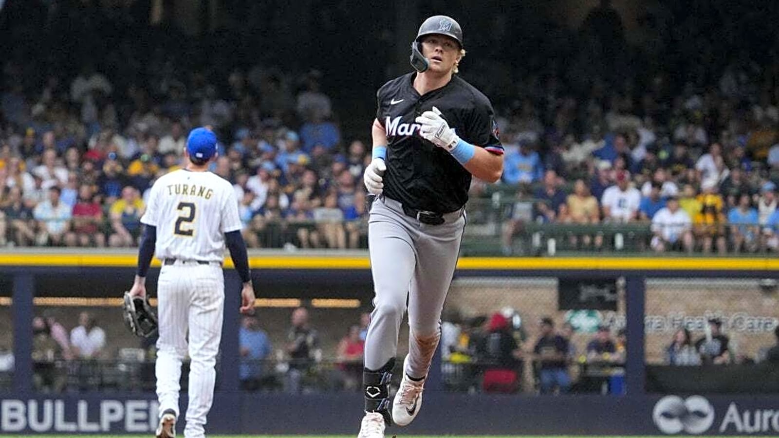 Marlins cool off Brewers to open series