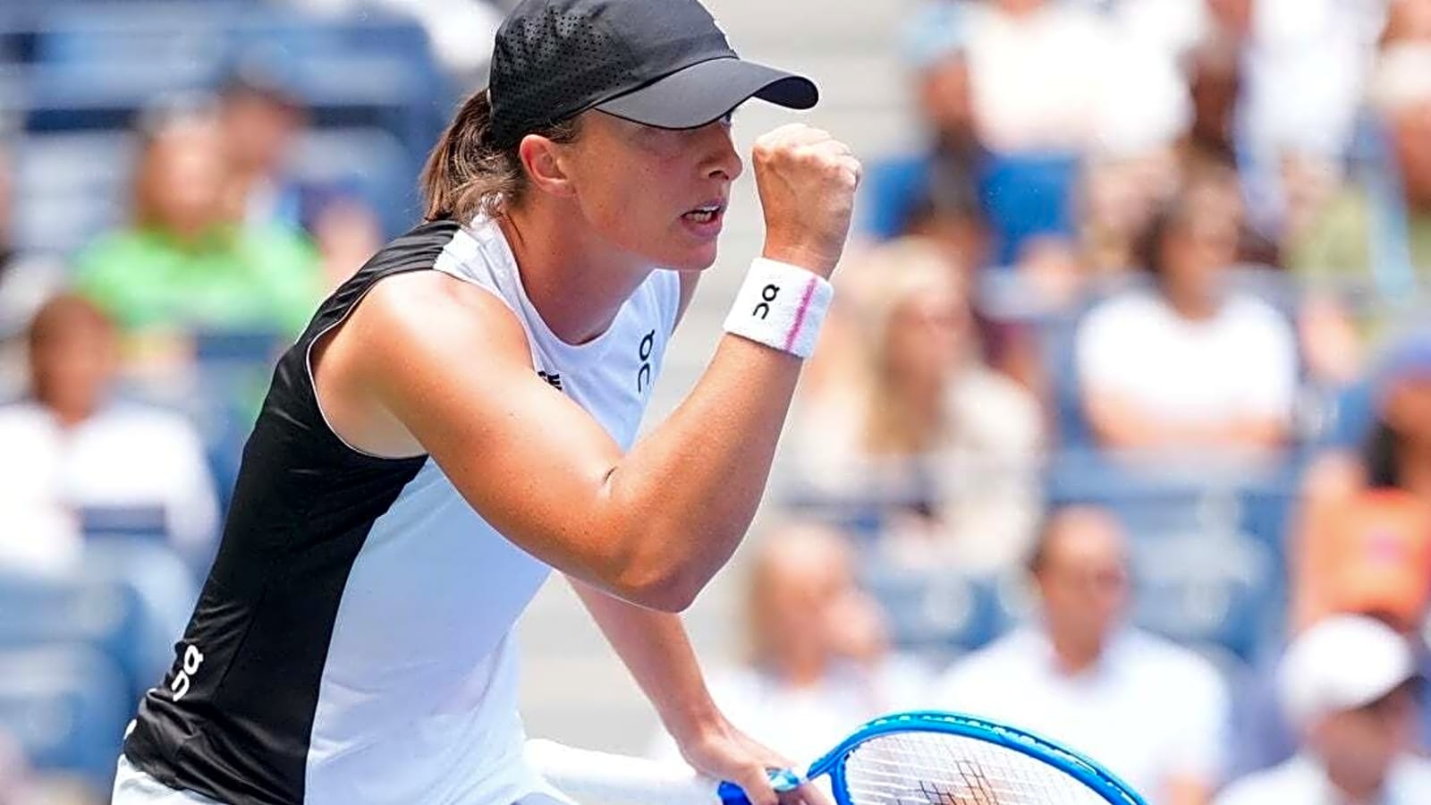 Iga Swiatek pushed to three sets but advances at U.S. Open