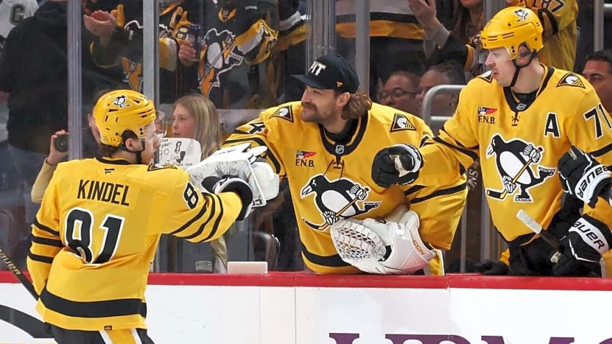 Penguins score four in second to handle Hawks