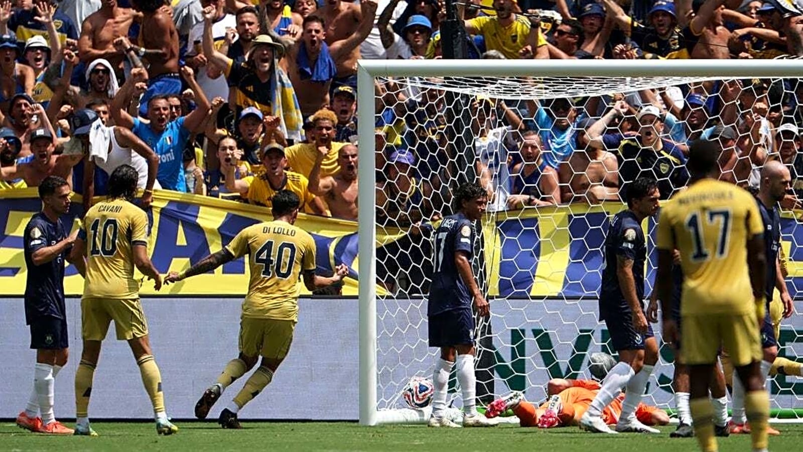 Heat, storms interrupt Boca Juniors-Auckland City with match tied at 1