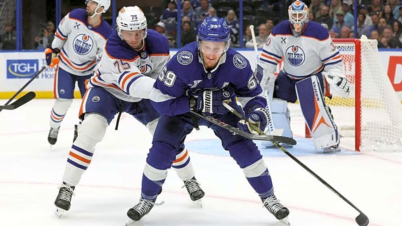 Lightning strike late, beat Oilers on wild OT sequence