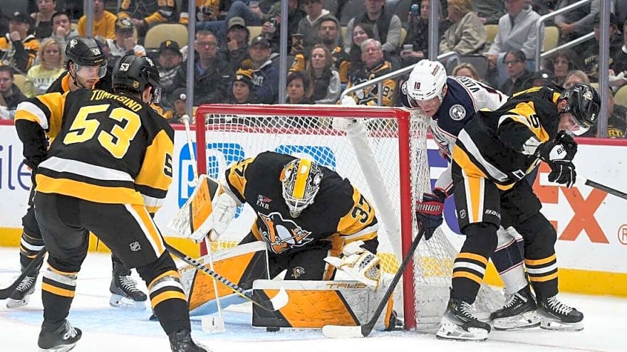 Jackets let lead slip way, but sink Penguins in shootout