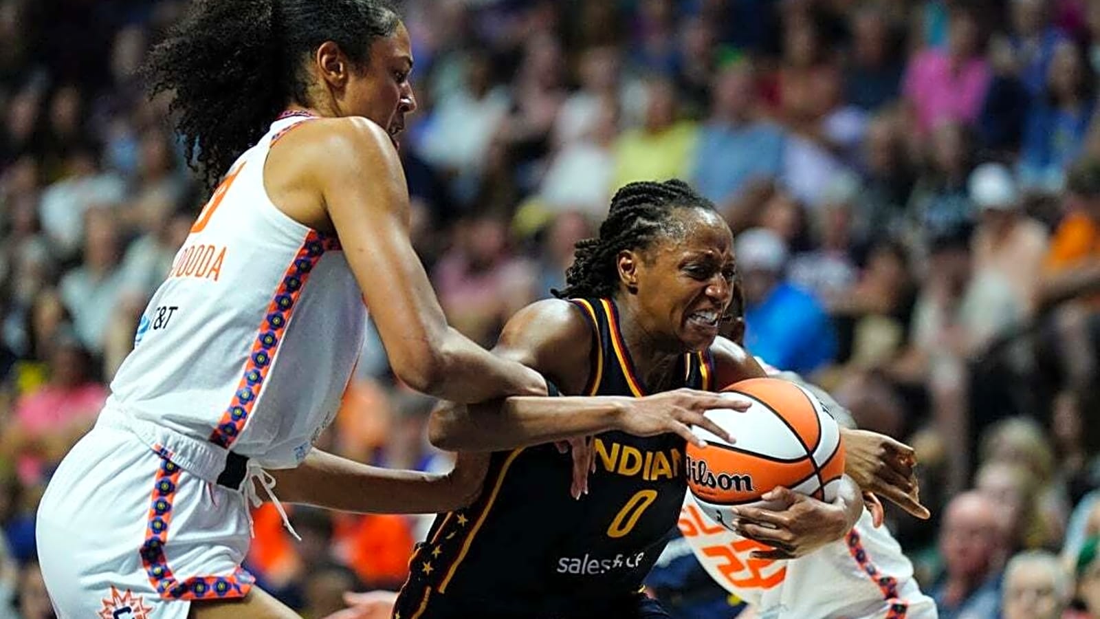 Kelsey Mitchell scores 38 as Fever storm back to beat Sun in OT