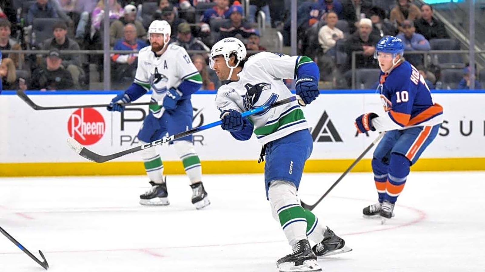 Kiefer Sherwood nabs hat trick as Canucks rock Islanders