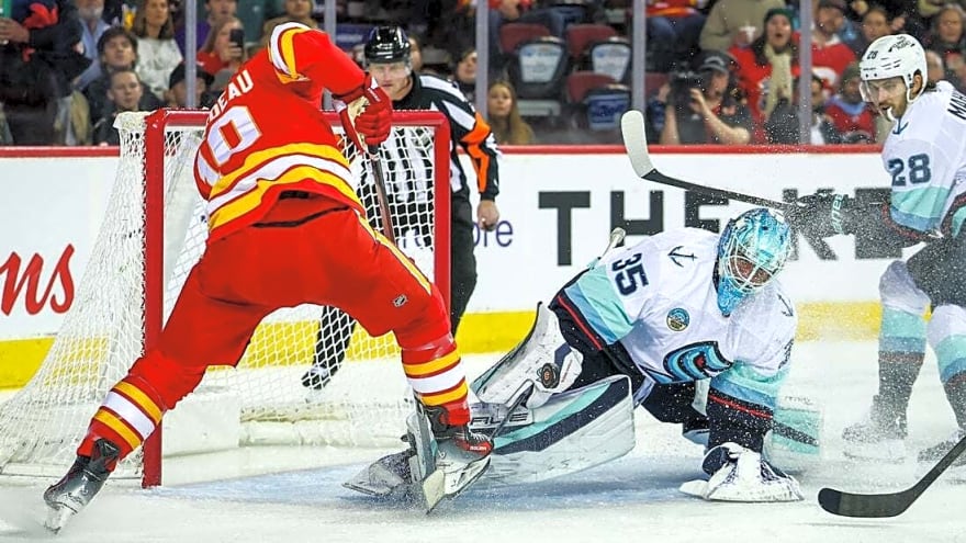 Flames score 3 goals in 3rd period, overtake Kraken