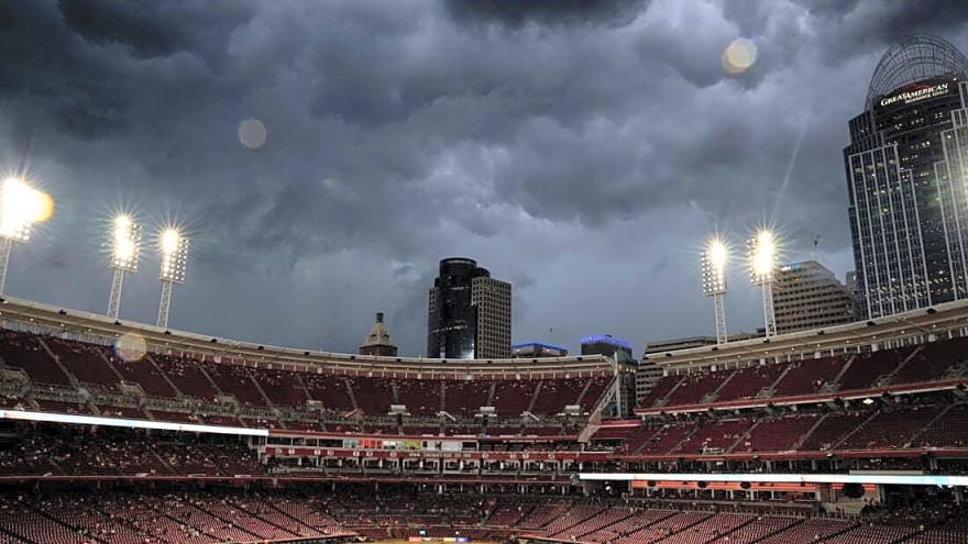 Reds outlast Twins for rain-shortened victory