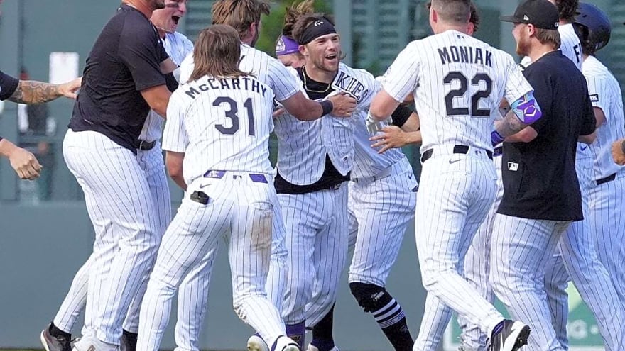 Rockies rally twice to drop Orioles in extras