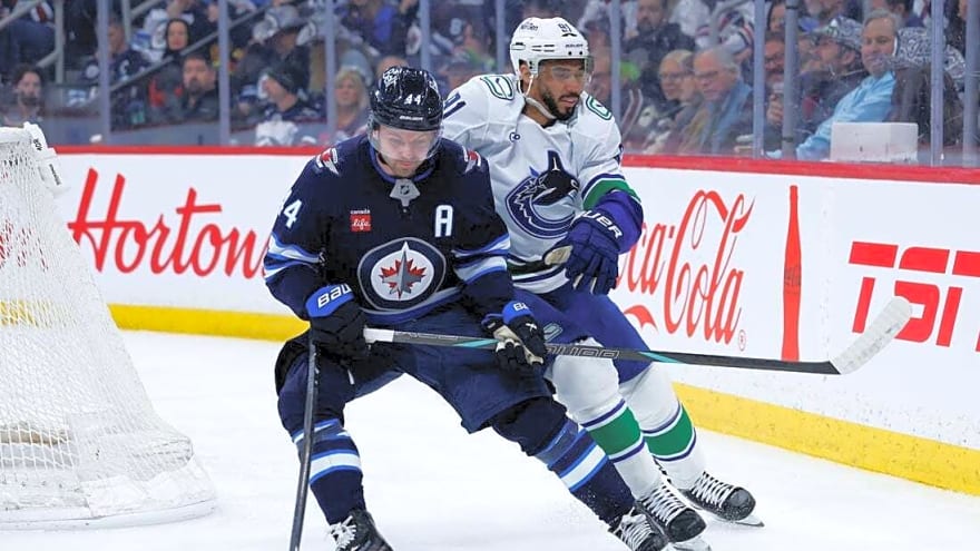 Josh Morrissey's OT goal in return lifts Jets over Canucks