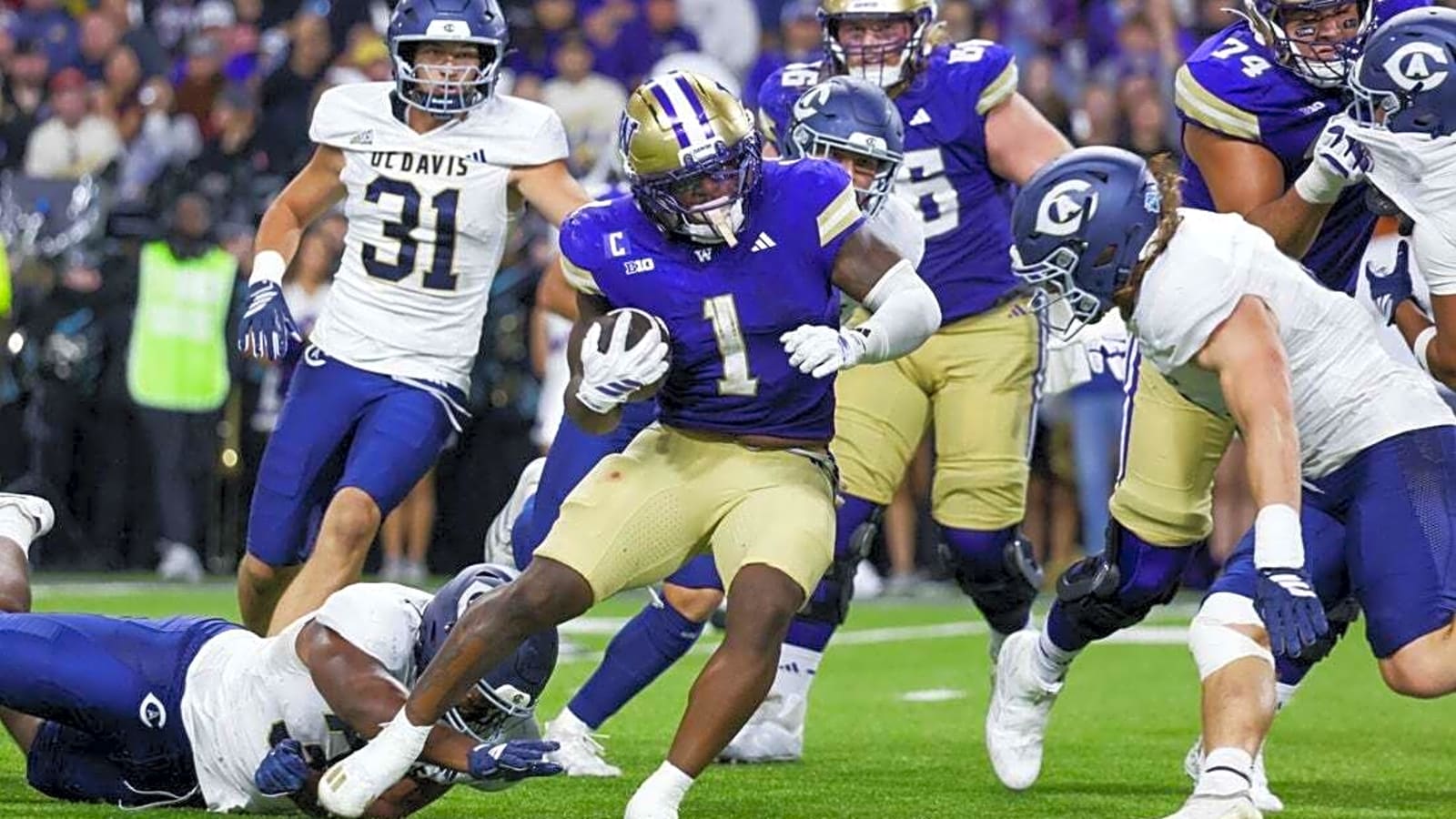 Jonah Coleman, Washington run all over UC Davis