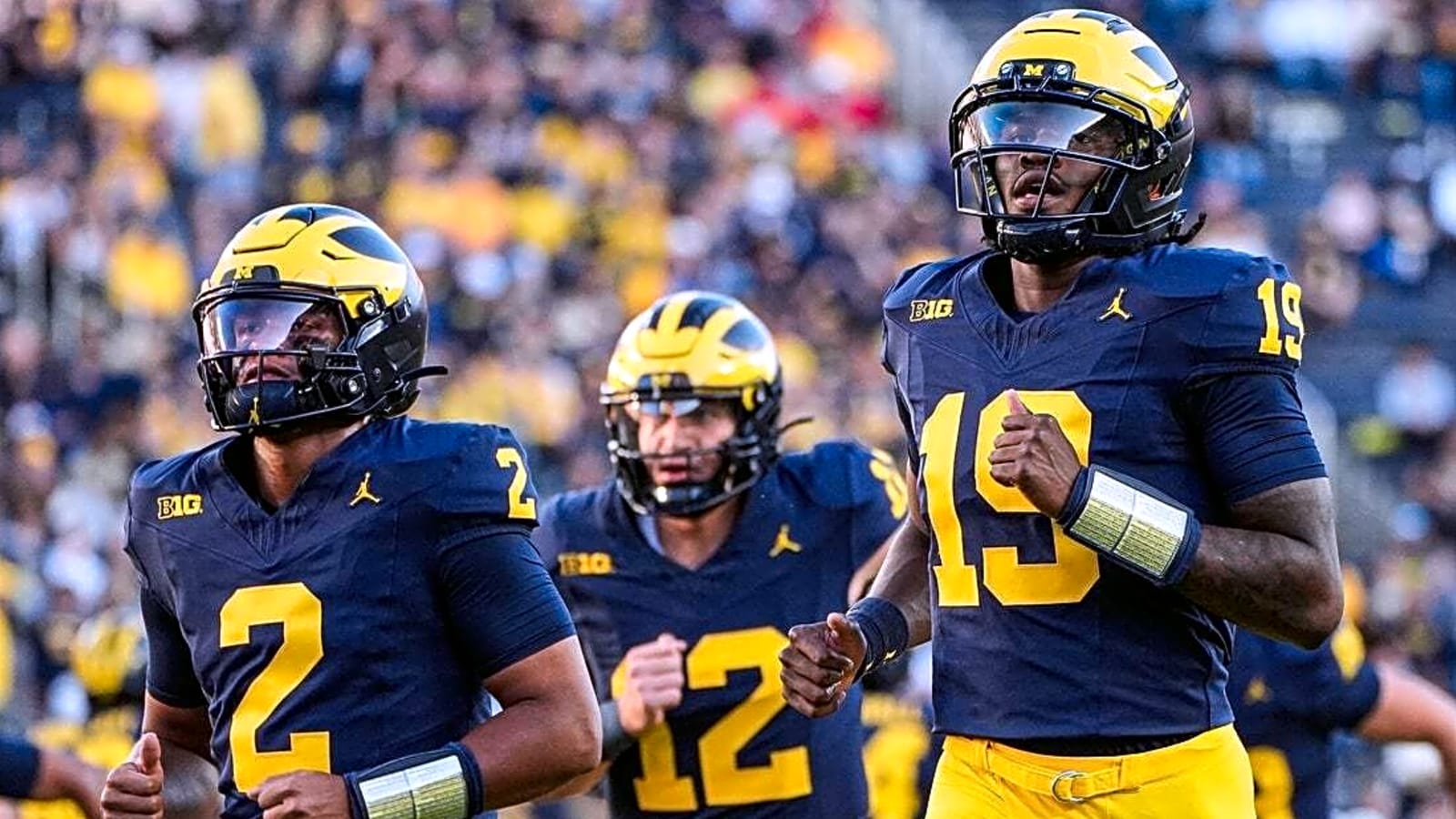 No. 15 Michigan visits No. 18 Oklahoma in rare blueblood clash