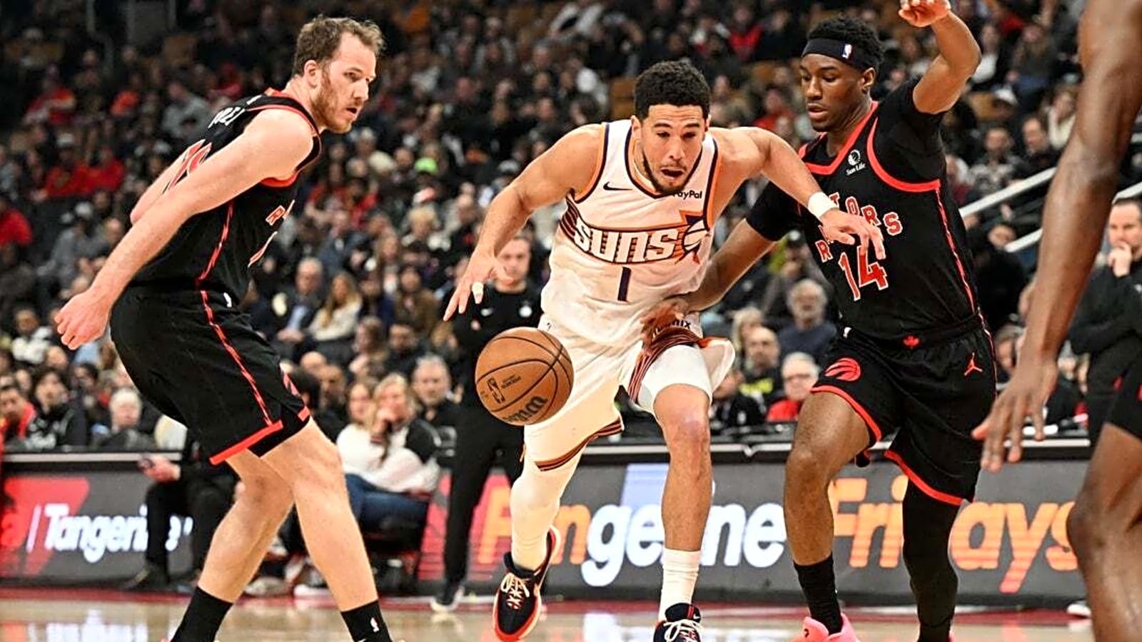 Raptors rally to knock off Suns