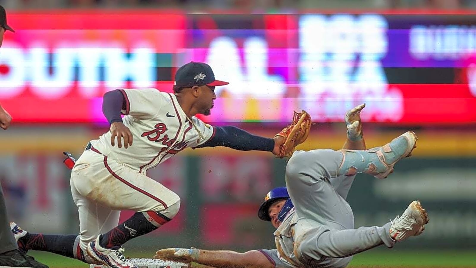 Braves rally late, edge Mets on sac fly in 10th