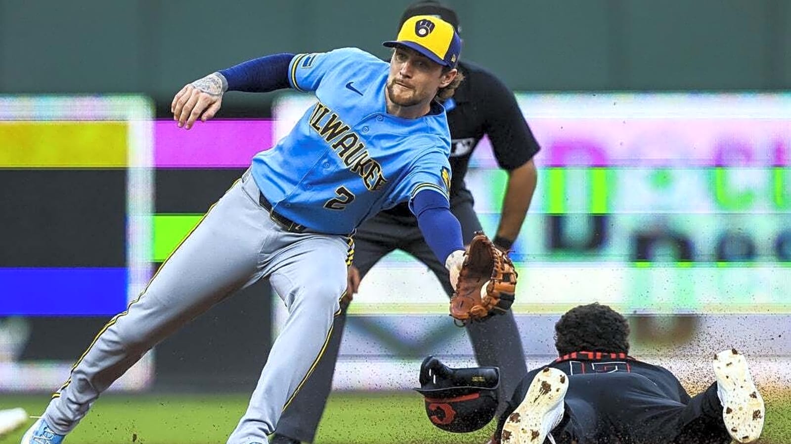 Fifth-inning uprising rallies Brewers past Reds