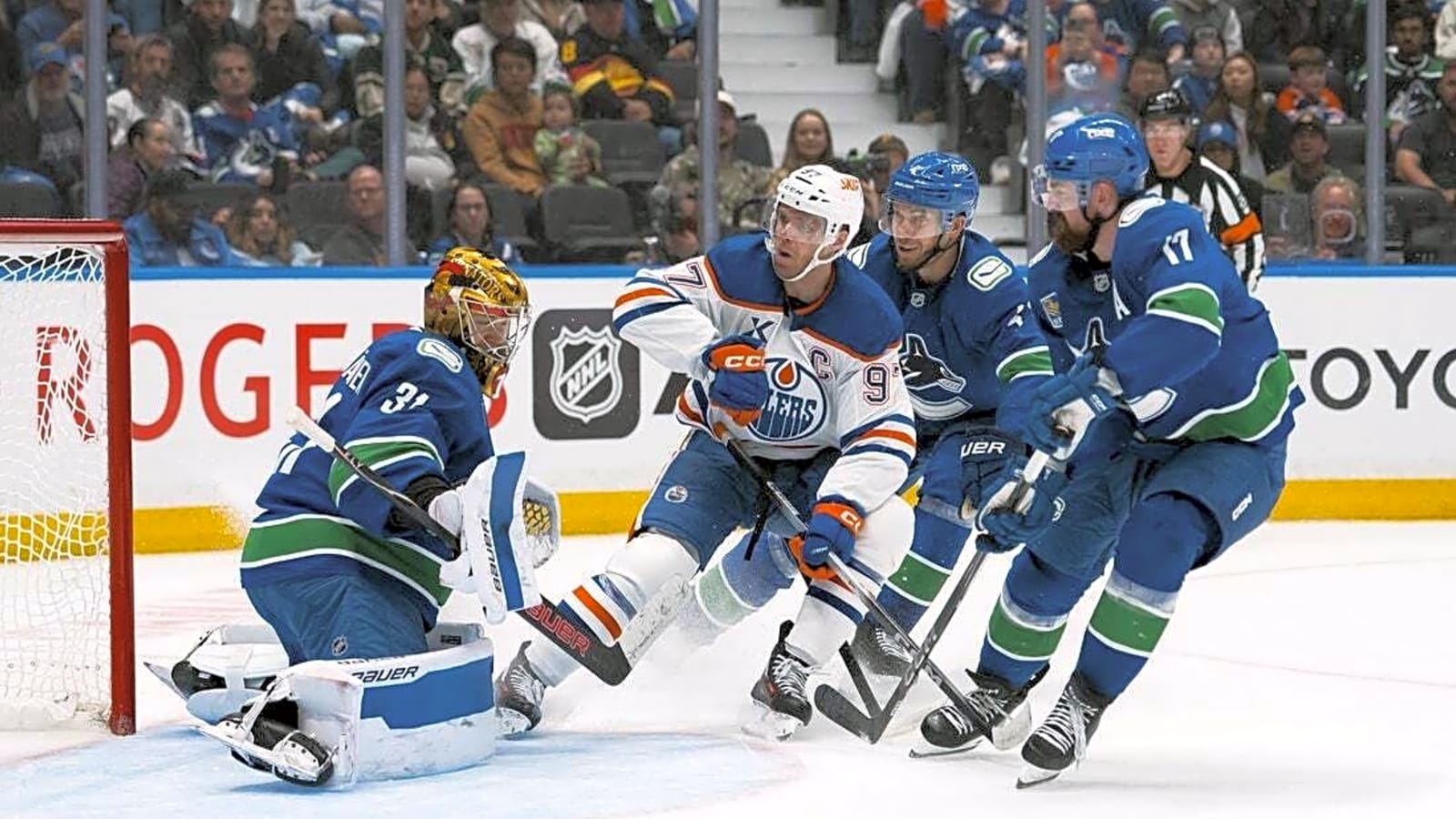 Canucks eager to fix defensive problems as Flames visit