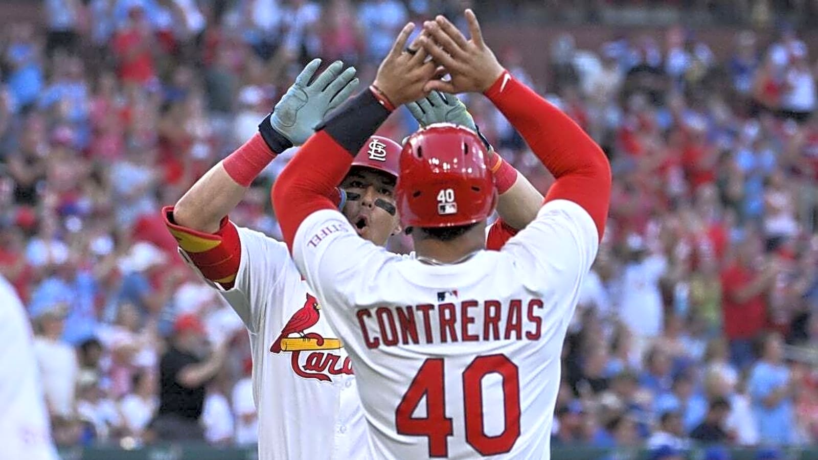 Cards club 4 homers, pummel first-place Cubs