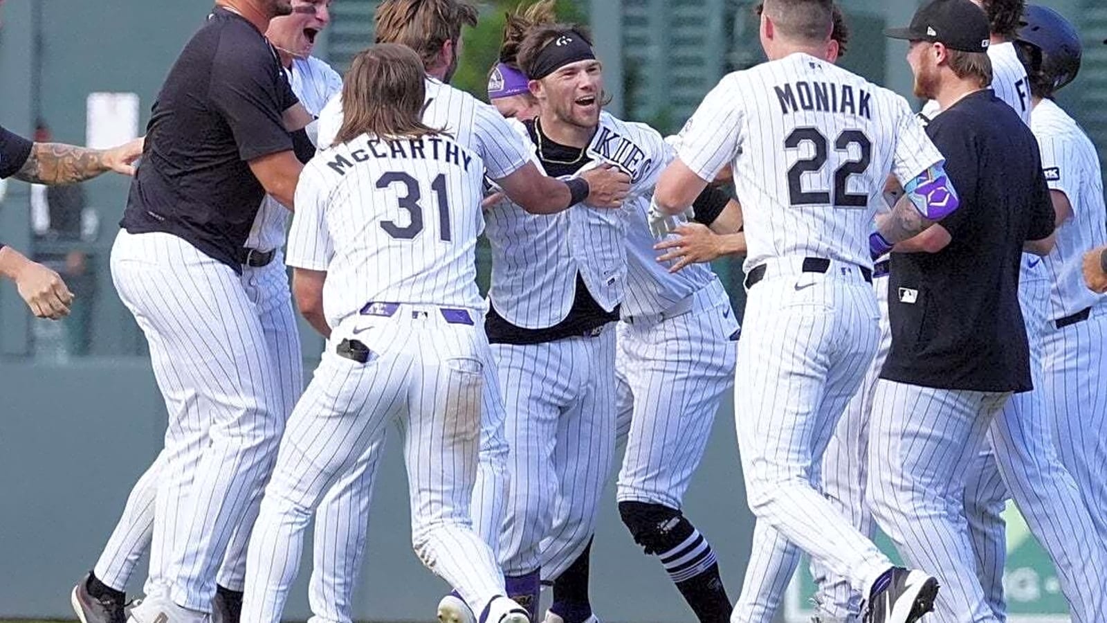 Rockies rally twice to drop Orioles in extras