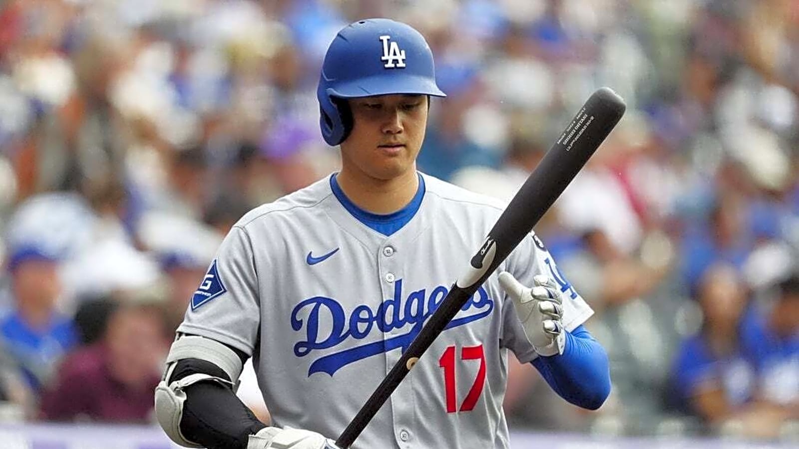 Dodgers outslug Rockies 9-7 to open series