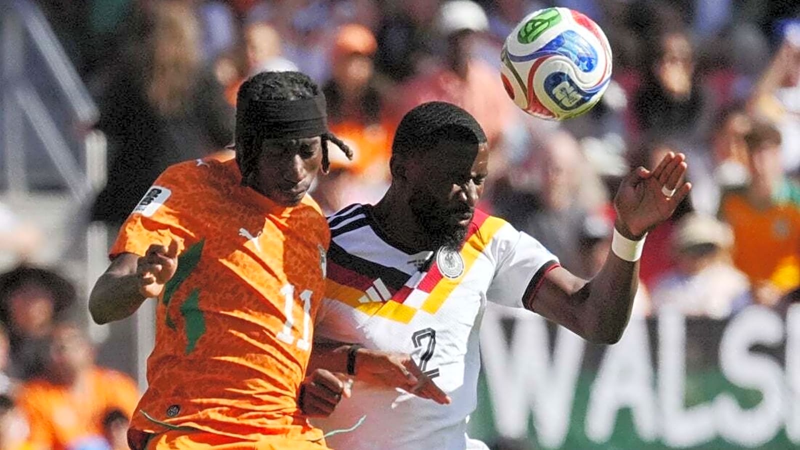 Late strike gets Germany past Ivory Coast, into knockout round